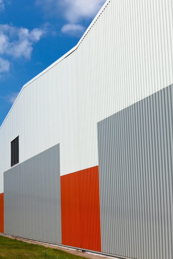 Abstract warehouse wall exterior capannoni in acciaio carpenteria metallica - glg doors